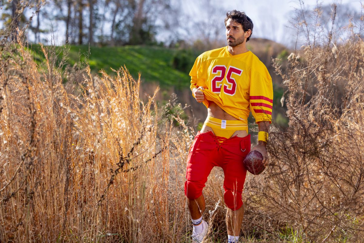 Yellow football jersey with red number 25 and stripes worn over red pants in BIKE Athletic BAS306 Original Number 10 yellow jockstrap color yellow