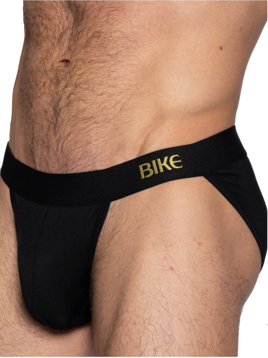 Black mens bike briefs with gold bike logo on waistband designed for athletic active use in color black