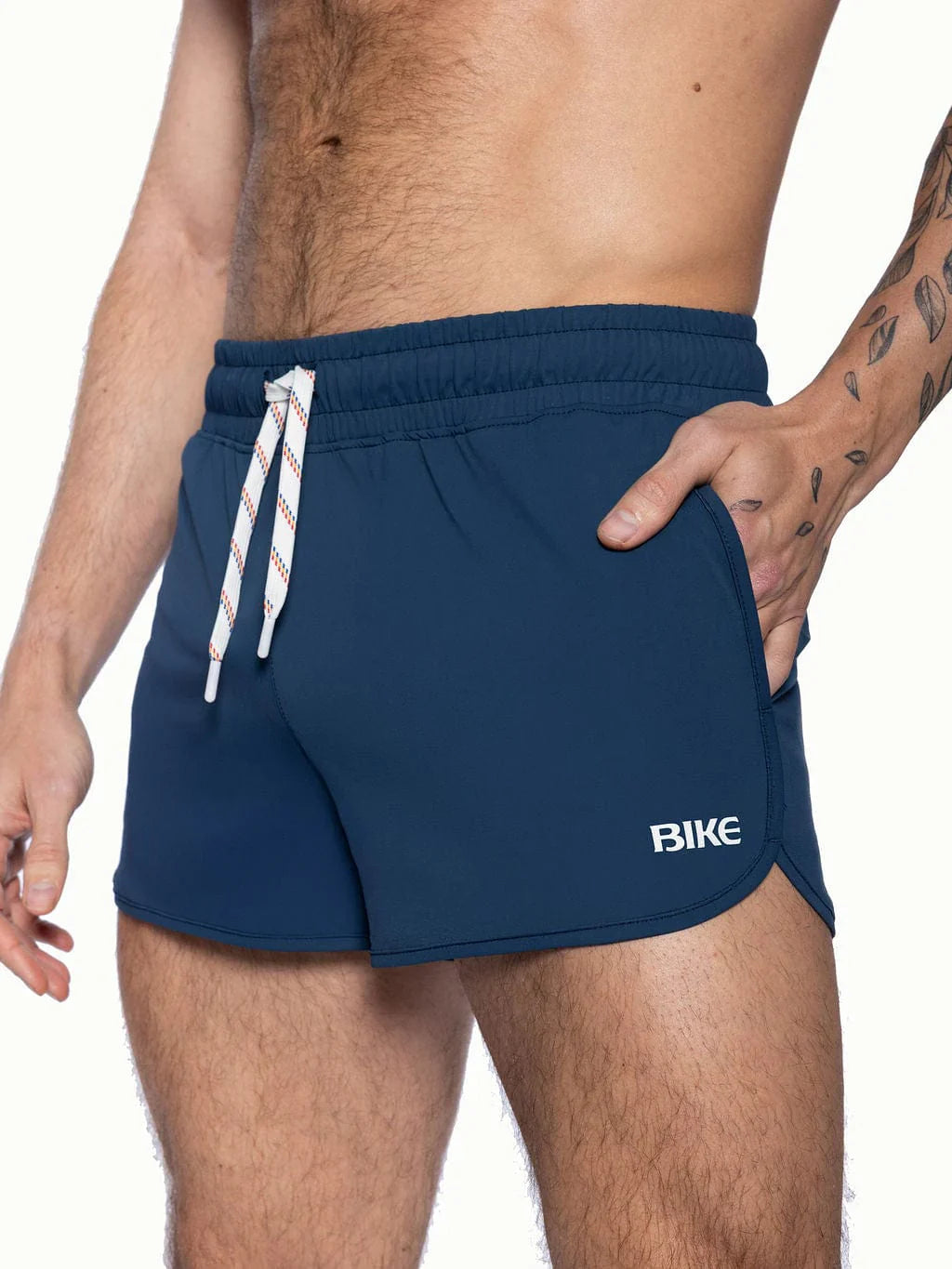 Navy blue bike track short with white drawstring and bike logo on the side designed for athletic use