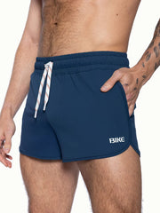 Navy blue bike track short with white drawstring and bike logo on the side designed for athletic use