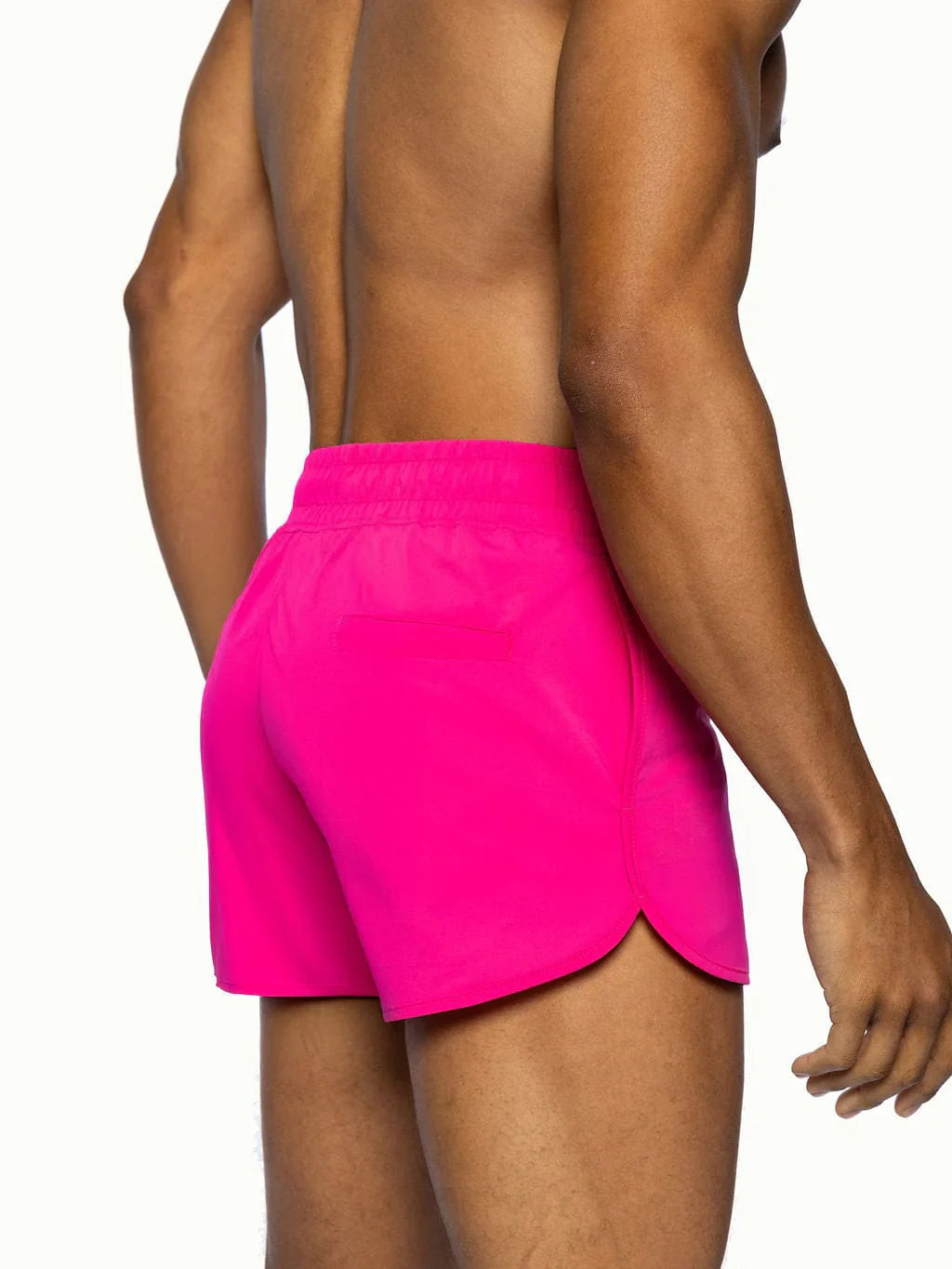 Bright pink bike track short with scalloped hem and elastic waistband designed for athletic use