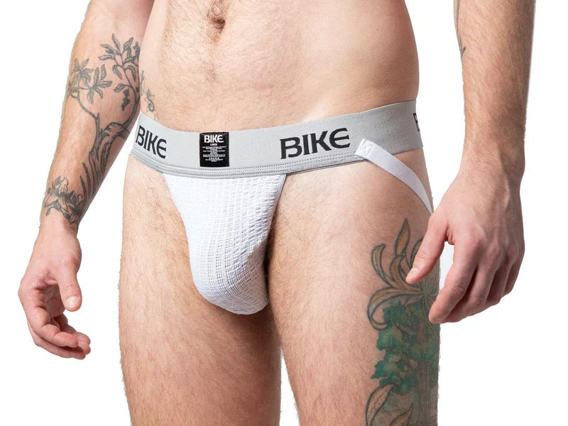 White textured athletic brief with gray waistband featuring bike branding and small black label for active use