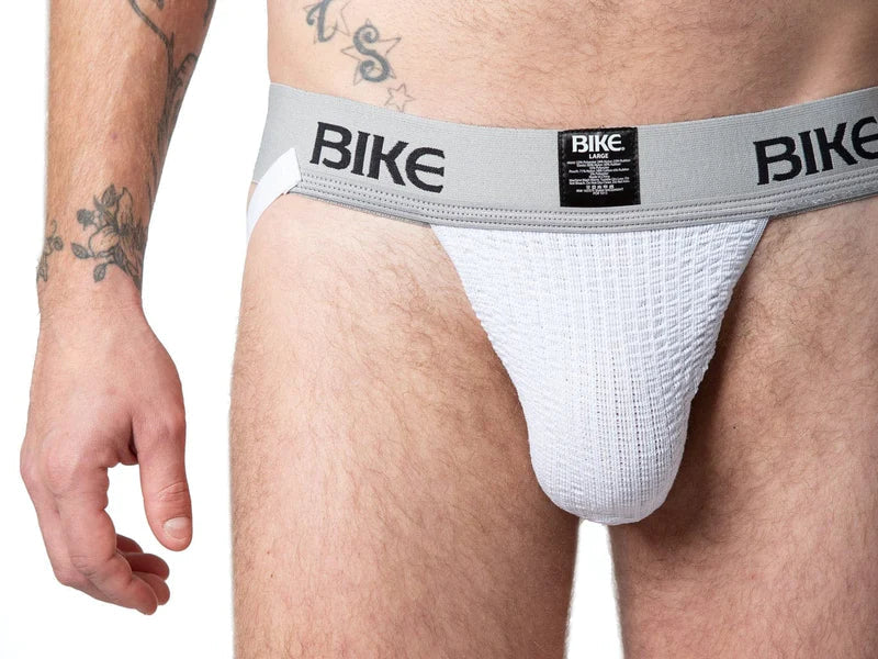 White textured athletic brief with gray waistband and black bike branding in the bike classic jockstrap design