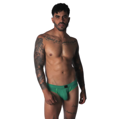 Bright green jockstrap with a contoured pouch, elastic waistband, and minimal coverage back design.