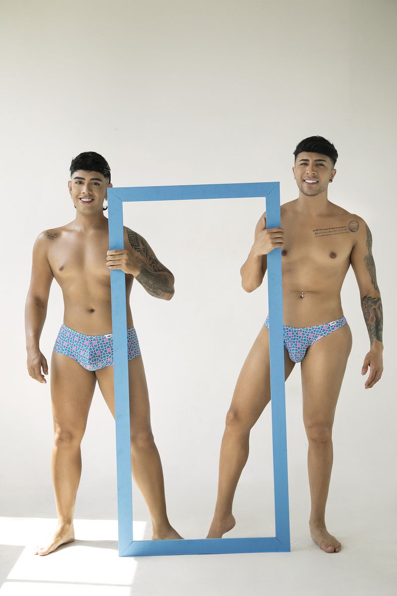 Blue patterned CandyMan 99924 swim trunks featuring printed thongs design for stylish beachwear