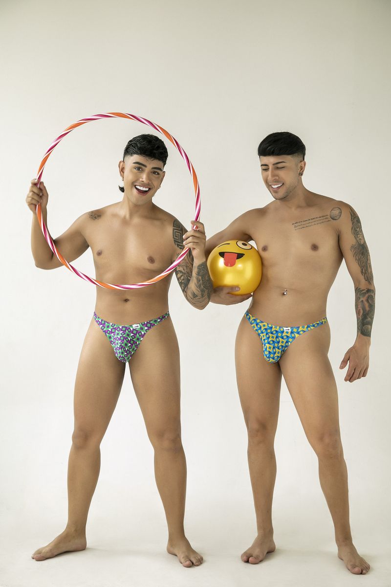 The candyMan 99924 thongs feature a colorful striped hula hoop design with orange and pink hues on a purple base