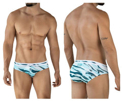 Men’s clever 2067 baru swim briefs in blue with bold teal and white abstract wave pattern and branded waistband logo