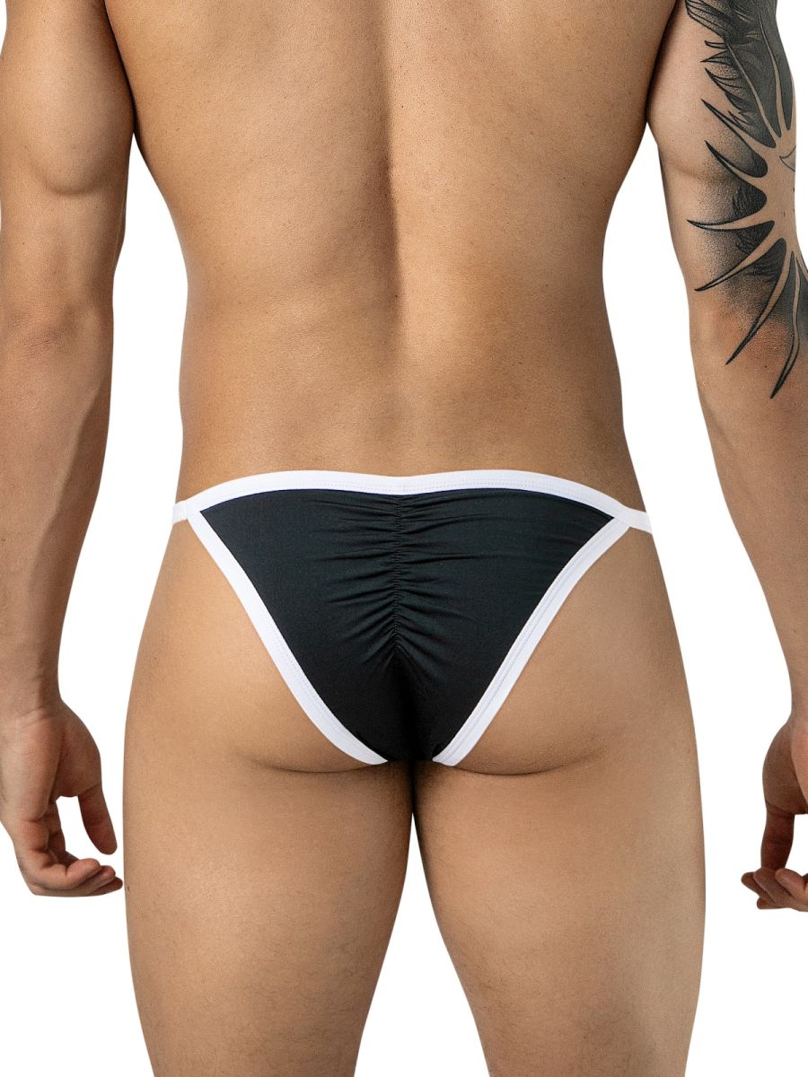 Rear view of a man wearing black Boreas briefs with white trim and a center-ruched back.