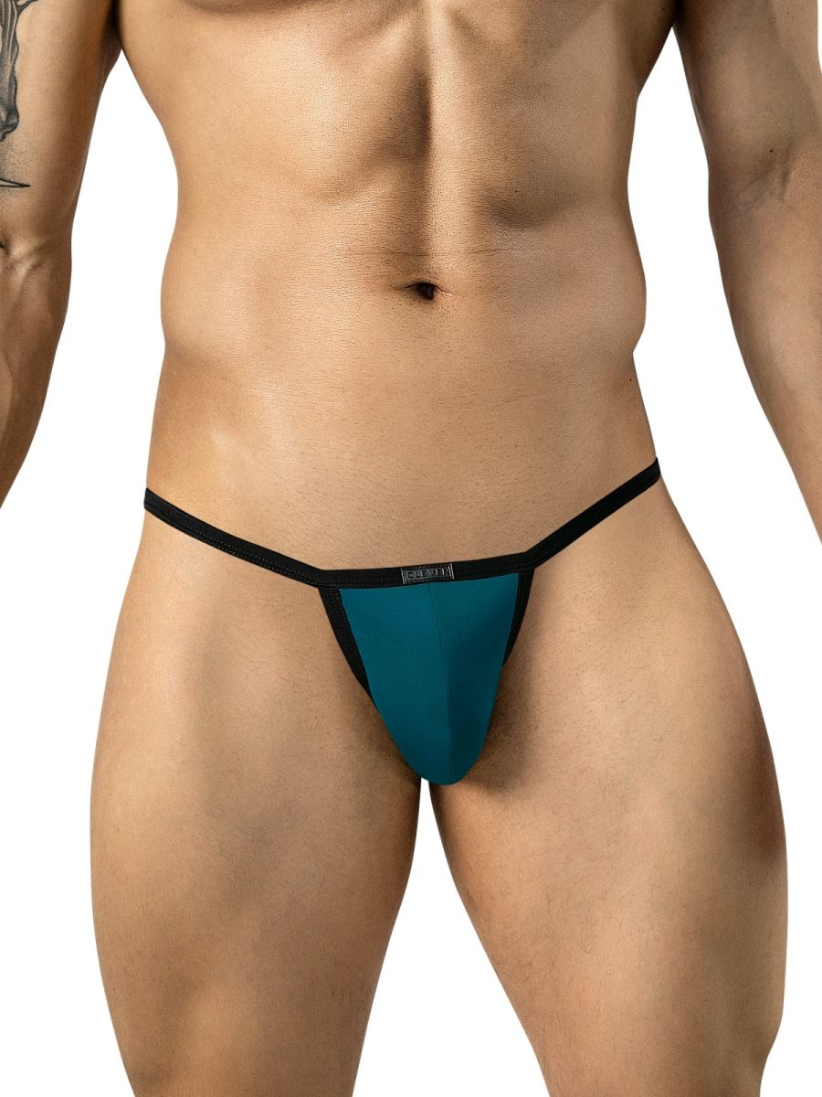 Clever Moda petrol blue sleek thong with black trim worn on a man.