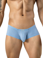 Clever Moda light blue textured trunks with a small branded waistband tag, modeled on a man.