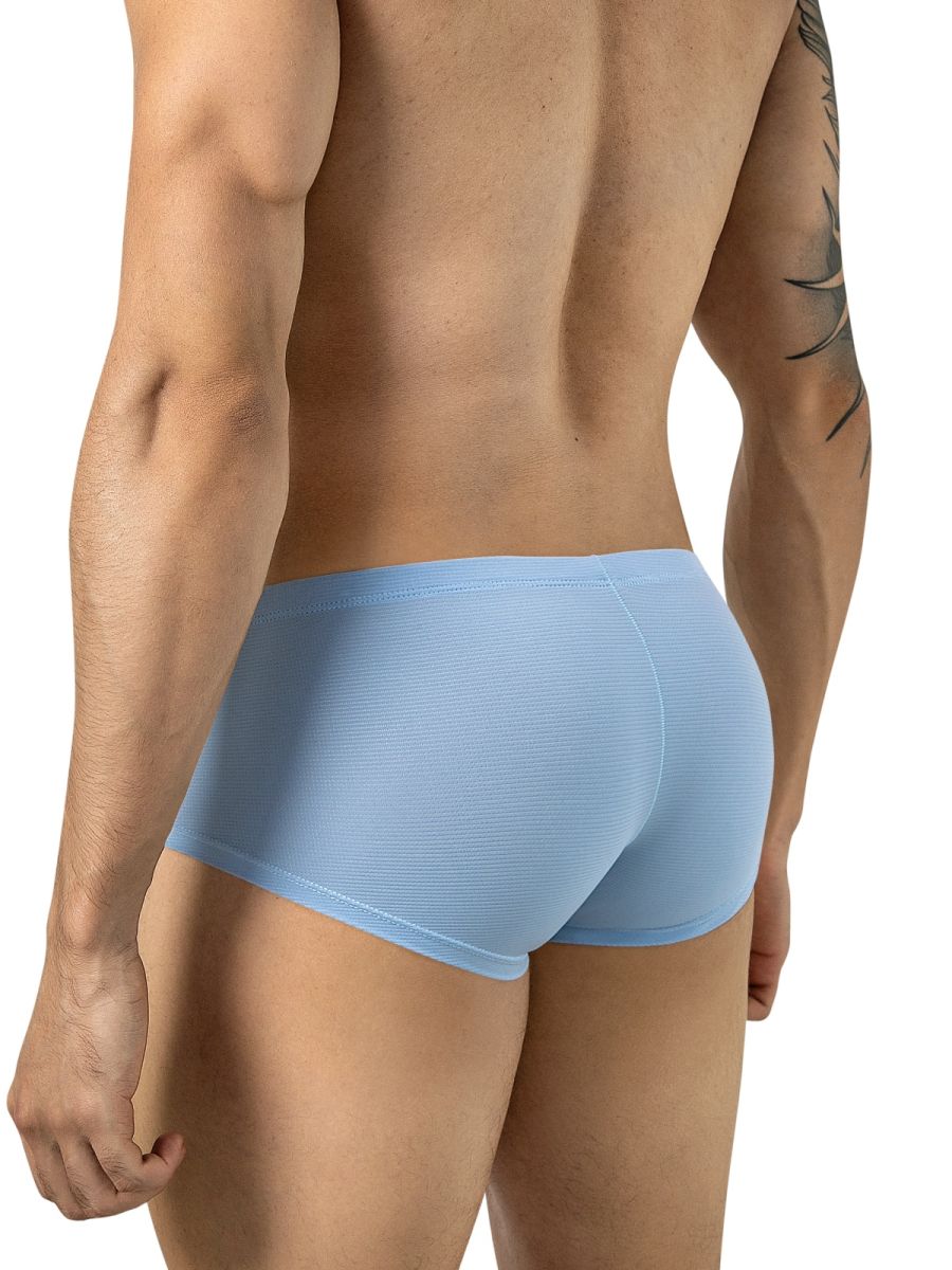 Rear view of a man wearing light blue Clever Moda Cronos trunks.