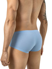 Rear view of a man wearing light blue Clever Moda Cronos trunks.