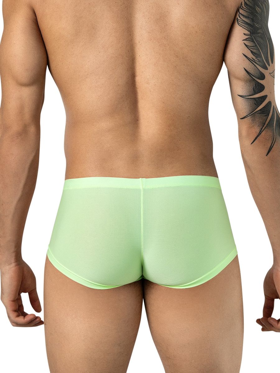 Rear view of a man wearing neon green Clever Moda Cronos trunks.