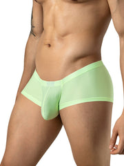Clever Moda neon green Cronos trunks with mesh fabric and a small front logo tag, worn by a man.