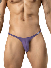 Clever Moda lilac micro-briefs with thin side straps and a small brand tag worn by a man.