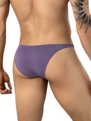 Rear view of a man wearing lilac brief-style underwear with a textured, subtle pattern.