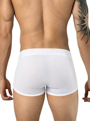 Rear view of a man wearing white Clever Moda Ulises trunks with a micro-mesh pattern and wide waistband.