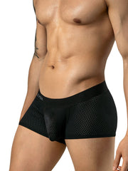 Black mesh low-rise trunks with a supportive contoured pouch and branded elastic waistband worn by a man.