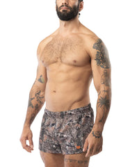 Core swim trunk timber camouflage athletic shorts with drawstring waistband and orange logo on lower right leg