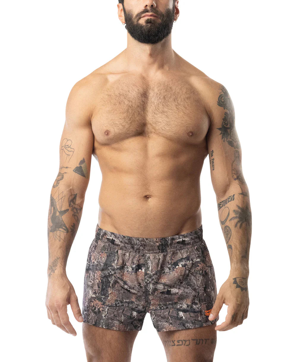 Men’s core swim trunk timber with camouflage pattern in earthy tones and subtle orange accents for swimwear use