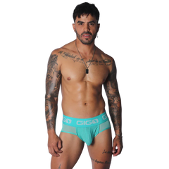 Aqua jock thong with mesh fabric, supportive pouch, and wide, branded elastic waistband with white logo lettering.