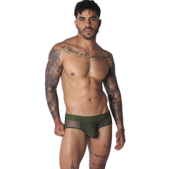 Olive green jockstrap featuring a mesh pouch and branded elastic waistband on a tattooed model.