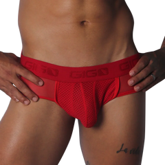 Red mesh jockstrap with a branded elastic waistband, featuring sheer side panels and a supportive contour pouch.