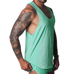 Flash green, metallic-finish racerback tank top with deep-cut armholes, worn by a muscular man.