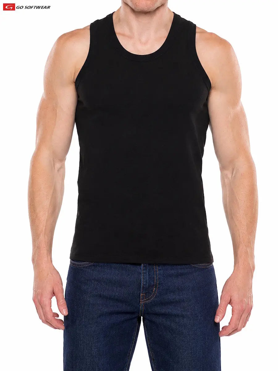Man wearing a black fitted sleeveless tank top paired with dark blue jeans by Go Softwear