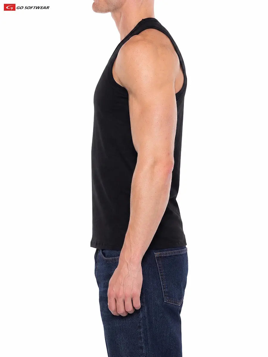 Side view of a man wearing a black fitted sleeveless tank top paired with dark blue jeans by Go Softwear