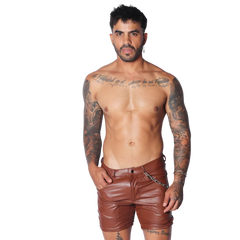Brown faux leather shorts with a slim fit, belt loops, and a decorative silver chain detail at the hip.