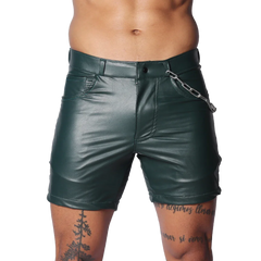 Dark green faux-leather shorts with a button closure, belt loops, and a decorative silver chain on the front pocket.
