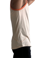 Cream-colored sleeveless tank top with orange ribbed neckline and matching hem stitching in sand beige color