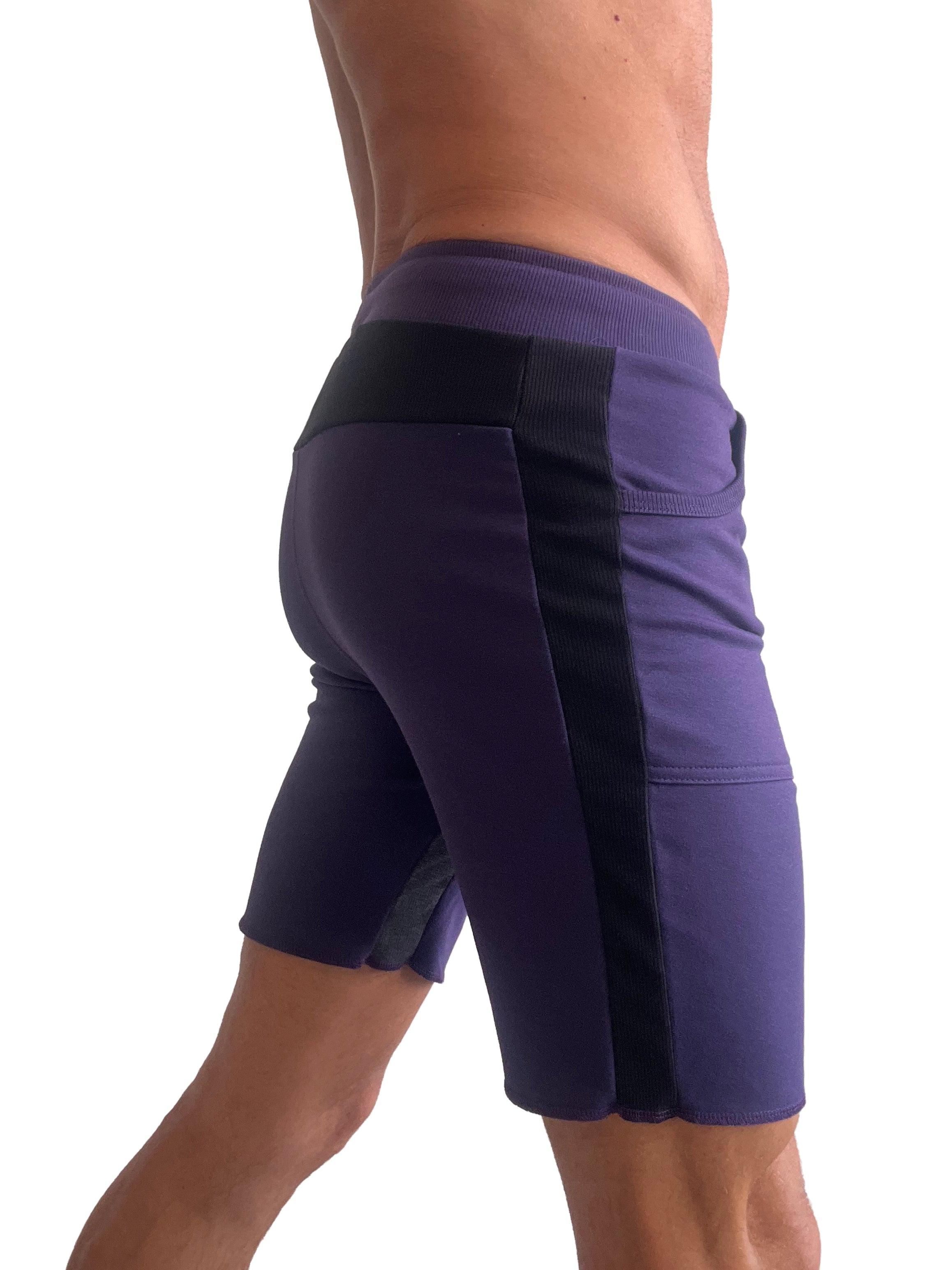 Purple tri-color ultra-flex yoga track shorts with black side panels and matching waistband for athletic use