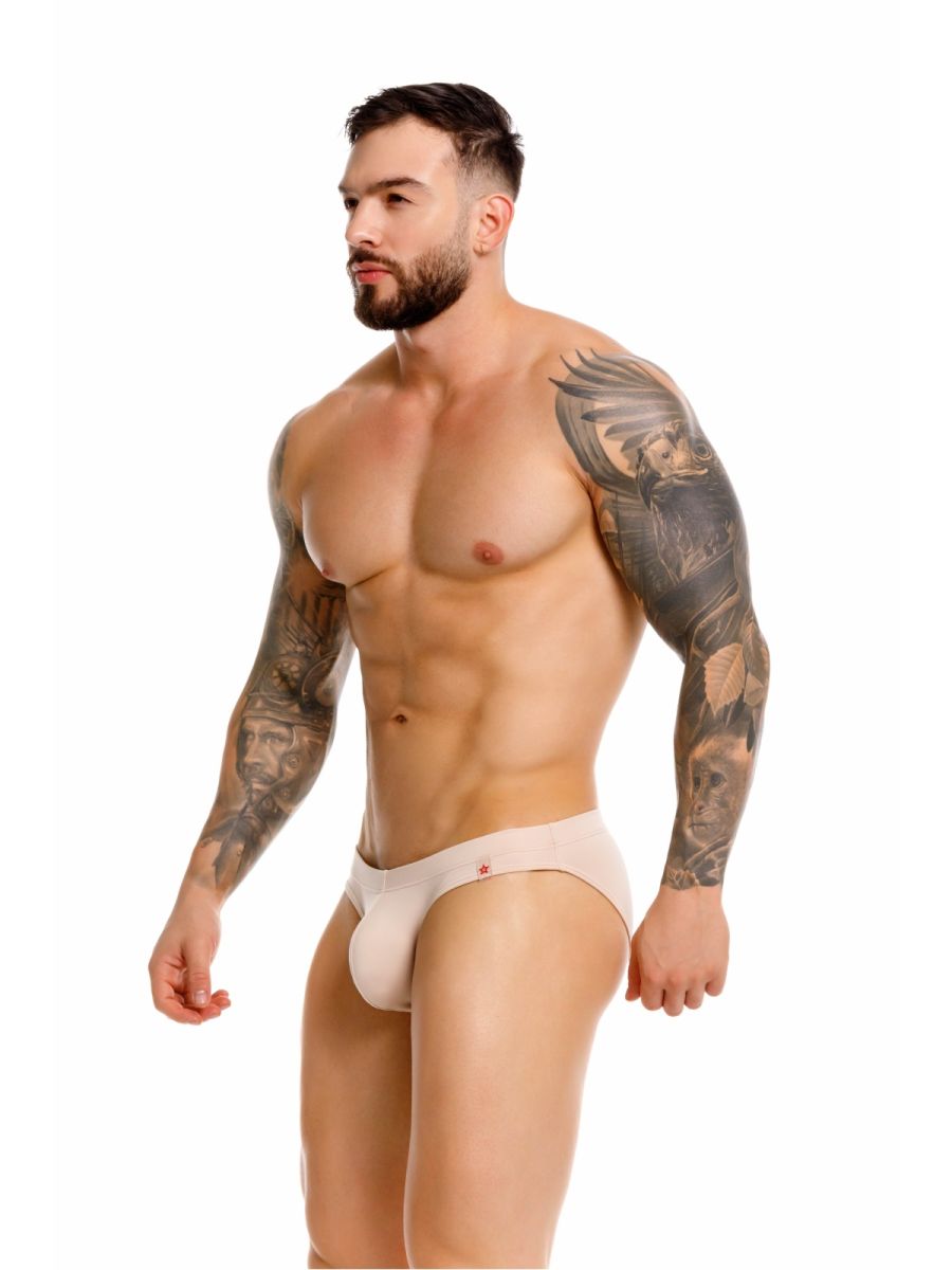White men’s briefs jor 2348 invisible bikini in beige with a small red logo on the side made from soft fabric