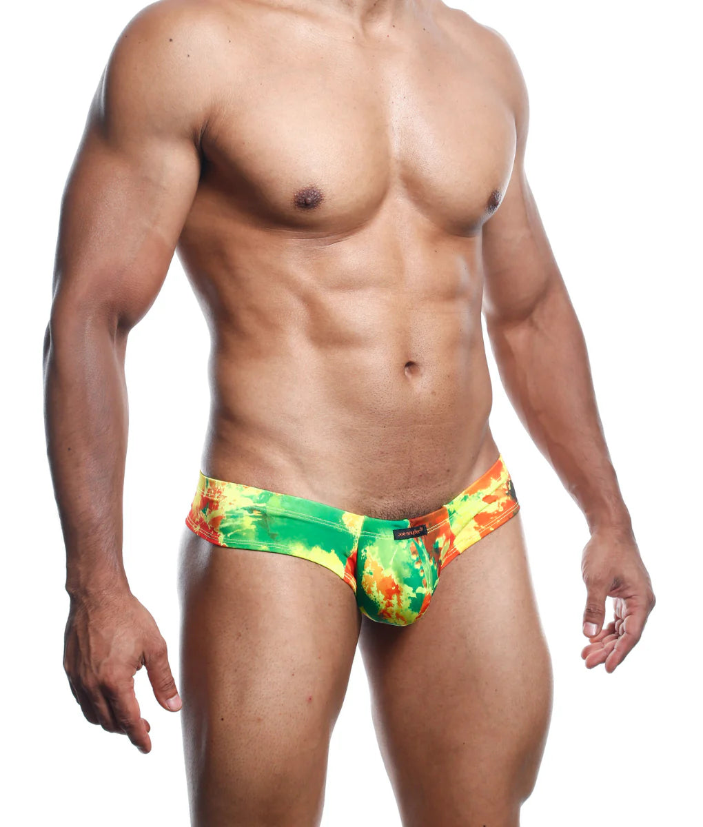 Vibrant tie-dye joe snyder mini cheek swim trunks in green yellow and orange hues for bold beachwear