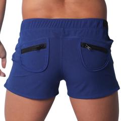 Royal blue short-length men’s athletic shorts with an elastic waistband and two back pockets featuring black zippers.