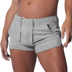 Gray mid-thigh athletic shorts with an elastic drawstring waistband and curved hem side slits.