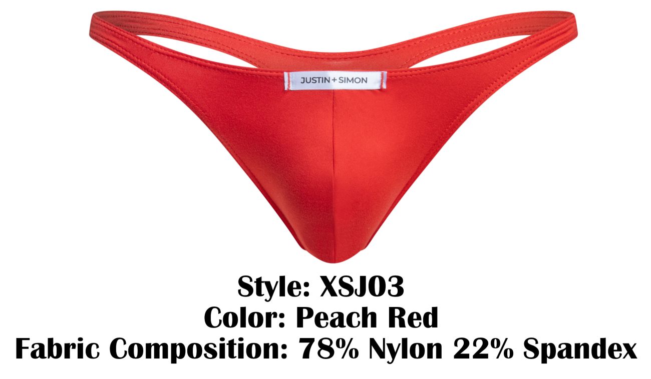 A vibrant peach red classic thong by justin + simon made of stretchy nylon and spandex with brand label at center