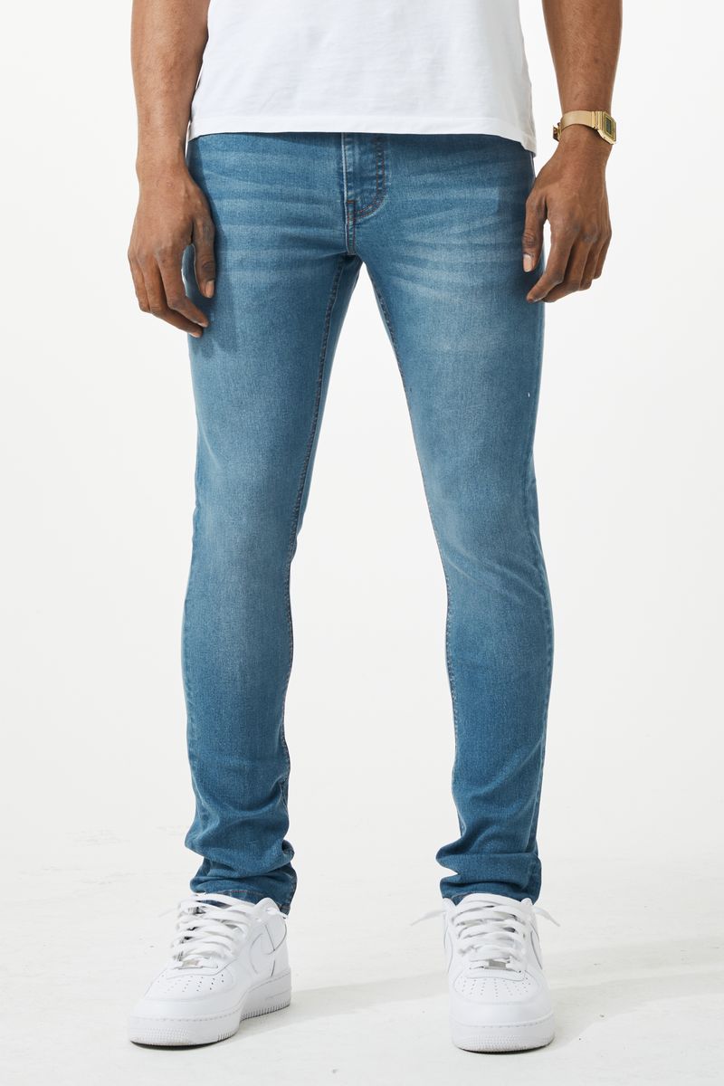 Skinny fit denim jean in blue with slim fit and subtle fading made from denim material