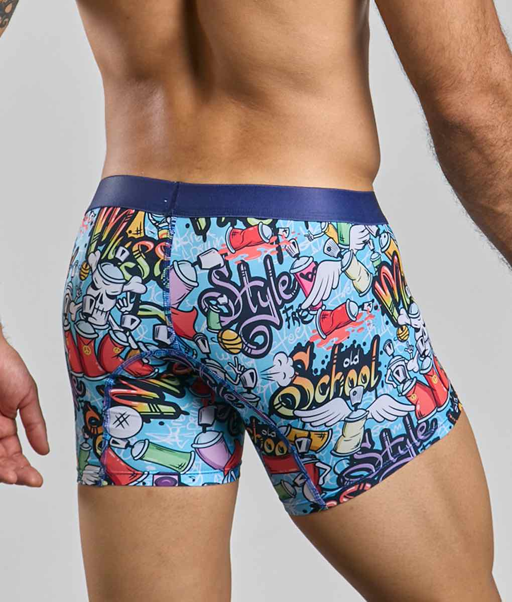 Malebasics boxer brief hipster in vibrant blue with bold graffiti-style spray cans wings and colorful stylized text