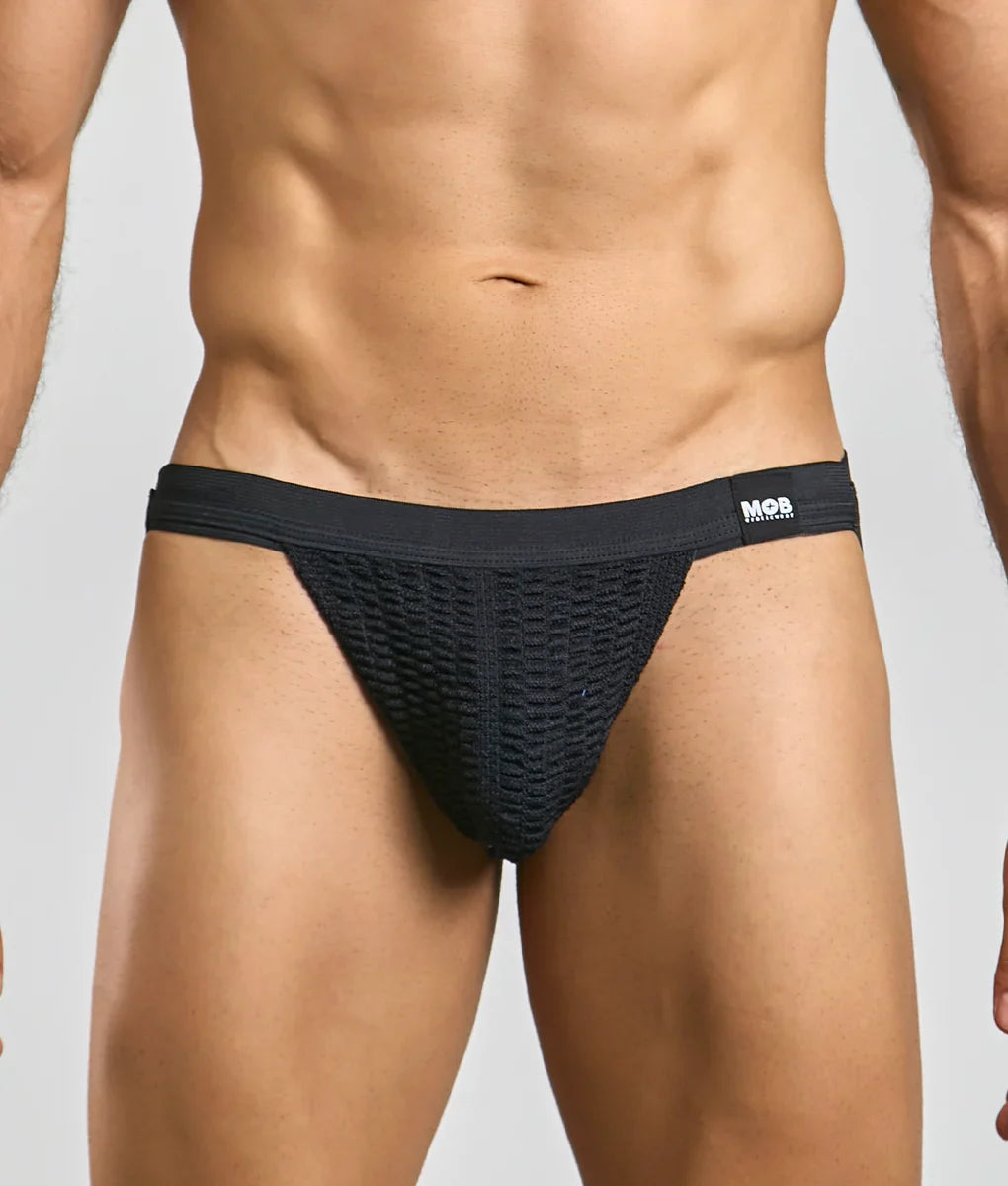 Black mesh mob swim jockstrap briefs with solid waistband featuring mos brand logo