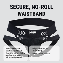 Men’s x jockstrap with black elastic waistband featuring white arrow graphics and mob eroticwear branding visible on back