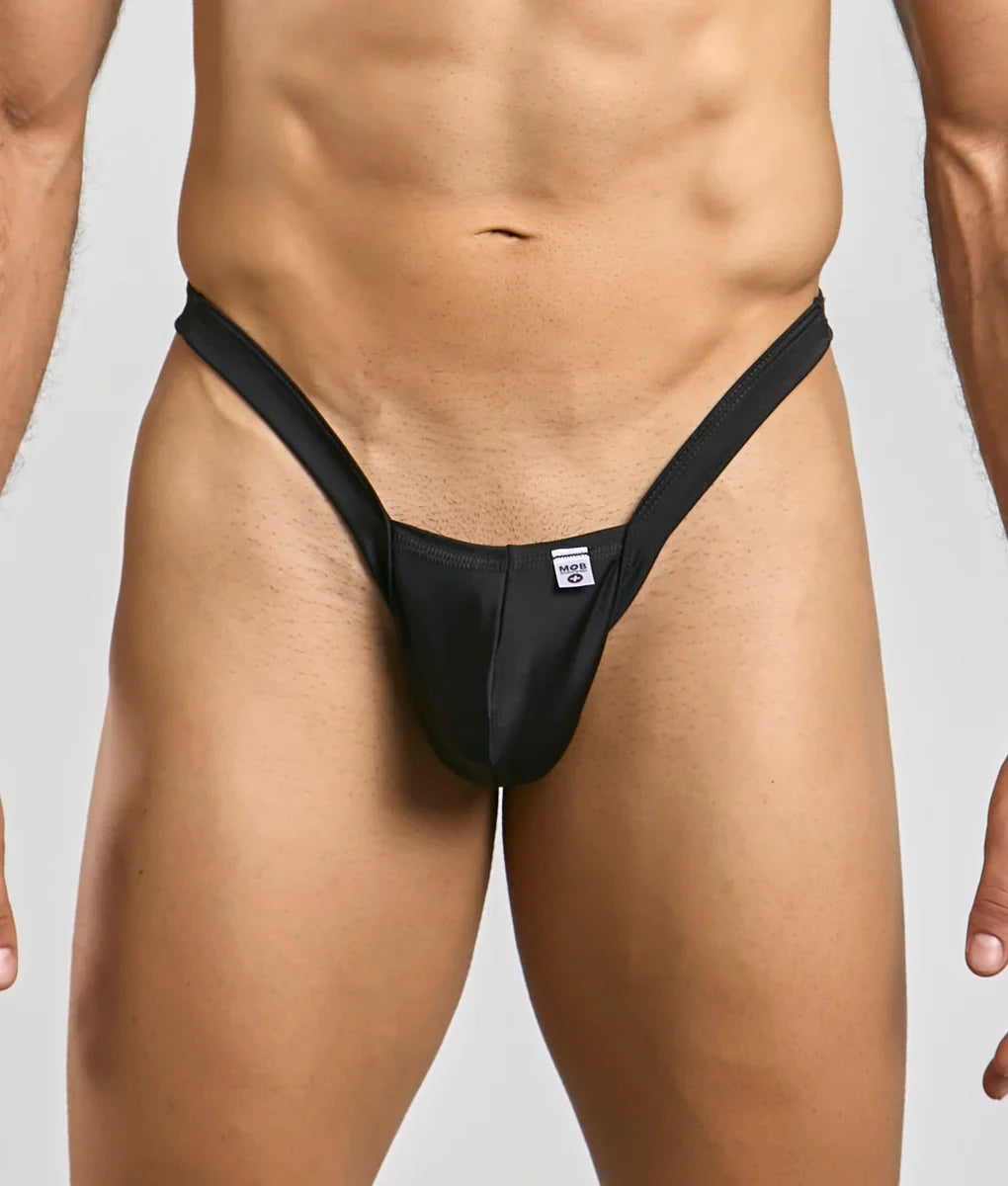 Black mob y buns thong with form-fitting sleek minimalist design and small white brand tag at the front