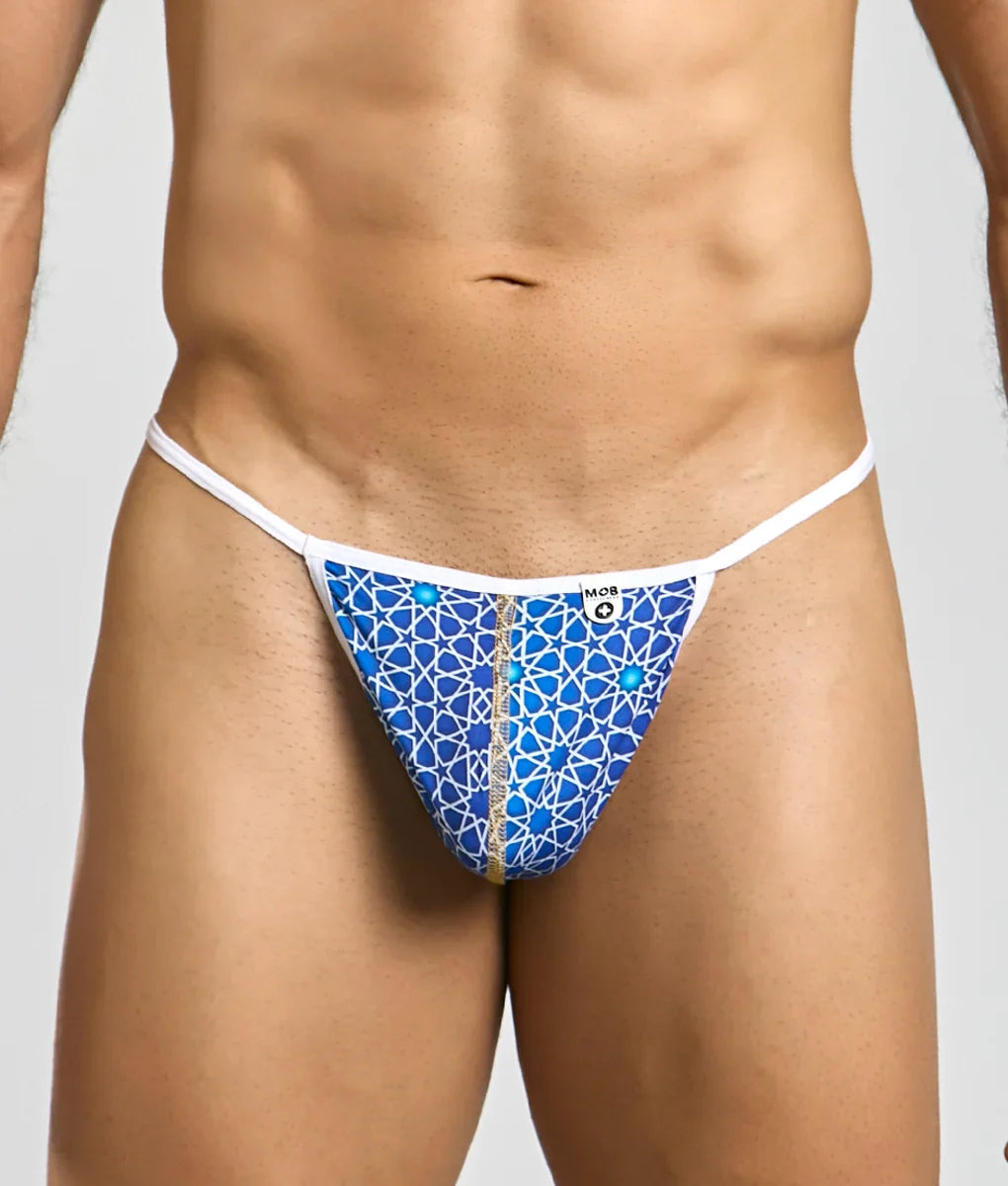 MOB Hipster T Thong Print blue patterned thong with white trim gold zipper and intricate geometric design front view