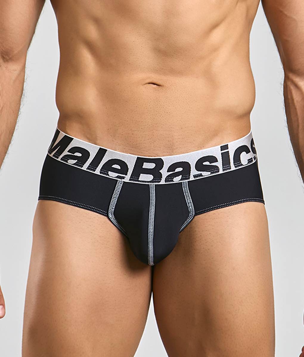 Black malebasics microfiber brief with white waistband, bold black lettering, and silver stitching along seams