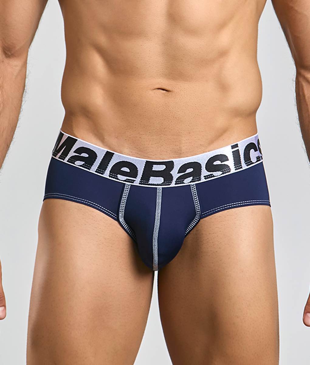 Navy blue malebasics microfiber briefs with white elastic waistband, black lettering, and light gray seam stitching