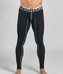 Black malebasics microfiber longjohn compression leggings with gray side panels and white waistband with brand name