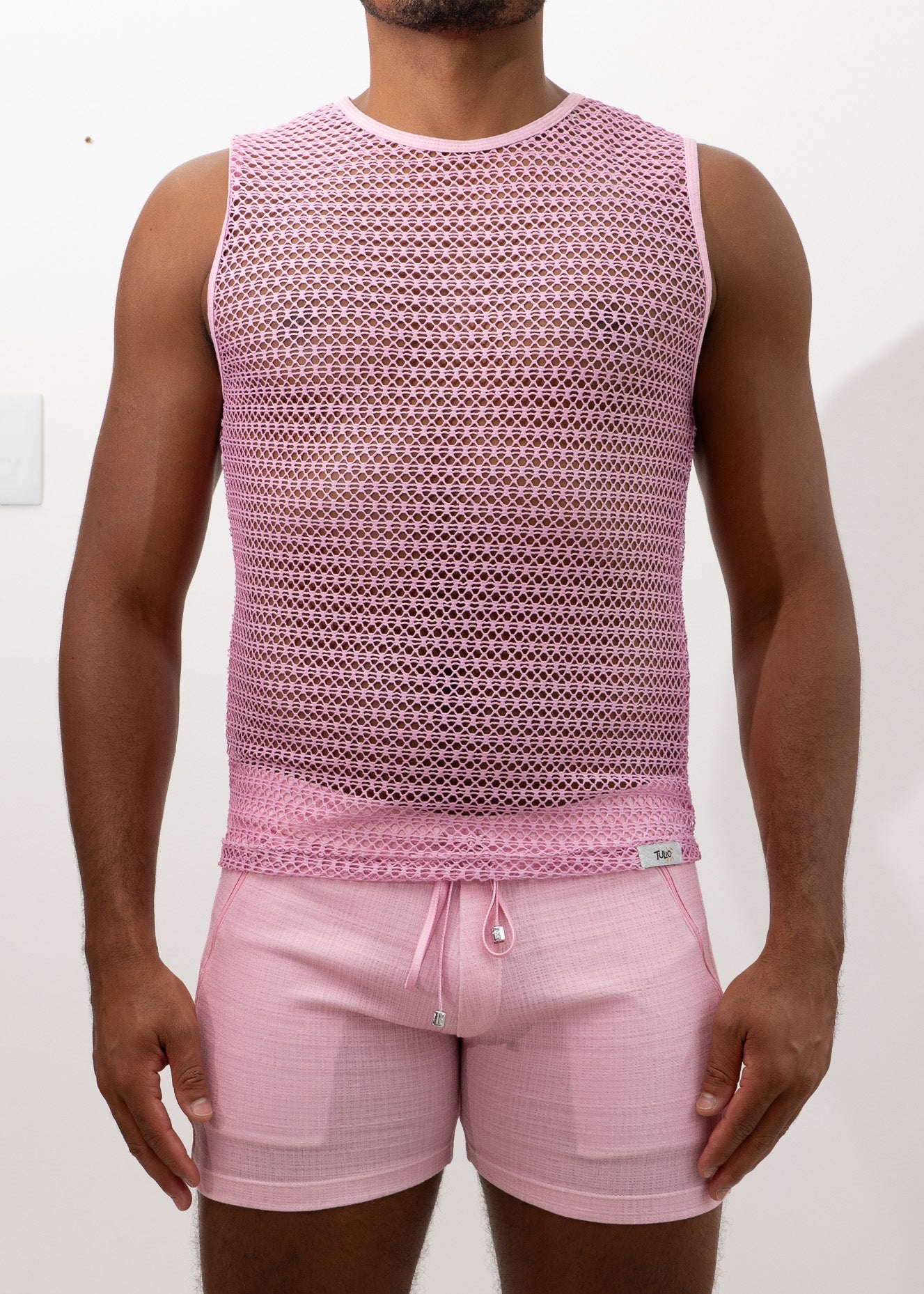 Pink mesh crochet muscle tank top with sleeveless design round neckline and subtle geometric pattern