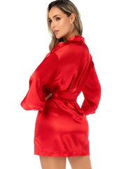 A woman wearing a red satin robe with long sleeves and a matching tie belt, shown from the back.